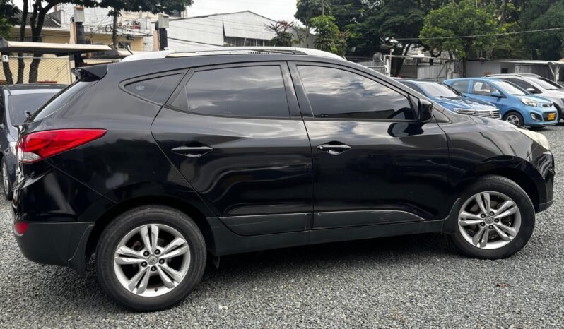 
								Hyundai Tucson I35 GL full									