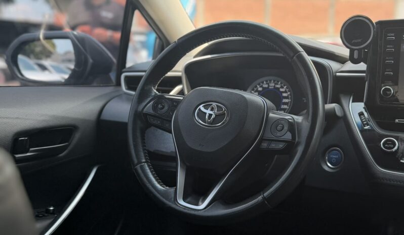 
								TOYOTA COROLLA XE HIBRIDO full									