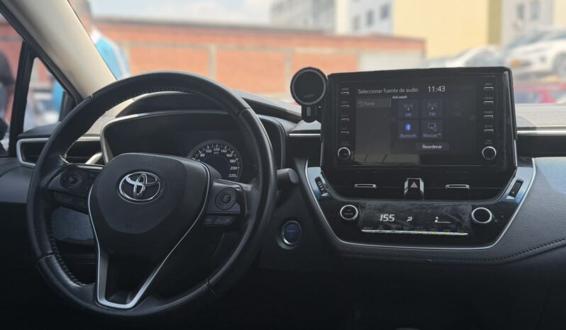 
								TOYOTA COROLLA XE HIBRIDO full									