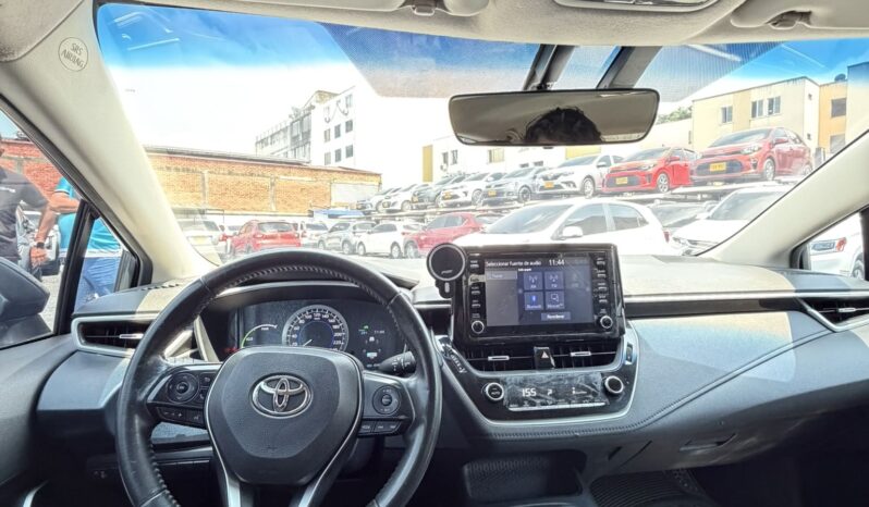 
								TOYOTA COROLLA XE HIBRIDO full									