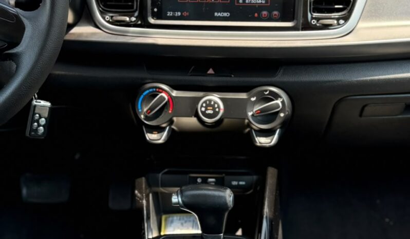 
								KIA RIO VIBRANT full									